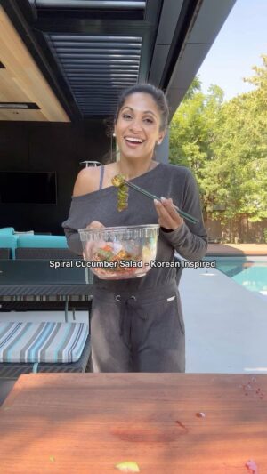 Sangita Patel Instagram - Spiral Cucumber Salad - Korean Inspired 🥒 
 
This is my first time trying this oh-so-fun salad I give it a 9/10 - watch till the end when gochugaru hits me 😂
But the accordion shape really holds the flavour in every bite! 
@feedmi_ thank you for recipe just added more veggies to it!

Recipe 
4-6 mini cucumbers 
1/2 cup of red onions sliced 
1/2 cup of carrots sliced
1 green onion
2 Tbsp of gochugaru (Korean chilli flakes) I would reduce this to 1, lol.
3 Tbsp rice vinegar
1 Tbsp sesame oil 
3 garlic cloves, minced
1 tsp sugar
1 Tbsp sesame seed

Give it a try! 

#CookinWSangi #SaladButNoLettuce #Fusion #fun #spiralcucumber