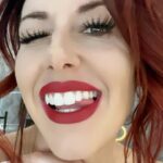 Santana Garrett Instagram - That red lip classic thing that you like.. 💋 This the season 🎄✨🎅🏻 #lyrics #TaylorSwift #redlips #reels #holidays #christmas #tistheseason #makeup
