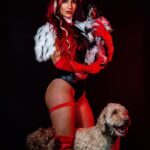 Santana Garrett Instagram - Instagram vs Office 😝❤️‍🔥 [swipe] #Costume Side note: missing my doodles, Roman & Rhea who both passed within months of one another.💔 But knowing they are together again puts my mind at ease.. Forever grateful for this shoot! 🖤😌 #Halloween #Costume #dog #dogsofinstagram #ig #trend