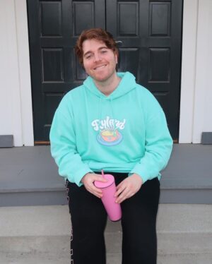 Shane Dawson Instagram - I like having his name on my chest so the zero people that hit on me know that I’m taken. 💪🏻🐷👍🏻 New Ryland hoodie and pink pig cup up now on my merch site! (link in bio) ❤️