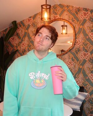 Shane Dawson Instagram - I like having his name on my chest so the zero people that hit on me know that I’m taken. 💪🏻🐷👍🏻 New Ryland hoodie and pink pig cup up now on my merch site! (link in bio) ❤️