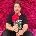 Shane Dawson Instagram - I just don’t know how to pose in front of a flower wall without making things weird. Thanks for the wall @jeffreestar! Not sure how you did this or where it came from but thank you for making my patio funeral goals 🌹❤️