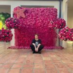 Shane Dawson Instagram - I just don’t know how to pose in front of a flower wall without making things weird. Thanks for the wall @jeffreestar! Not sure how you did this or where it came from but thank you for making my patio funeral goals 🌹❤️