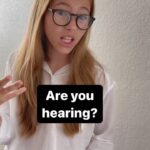 Shaylee Mansfield Instagram - What it is like when our family goes out. Hearing people asking us if one of us is hearing or can talk…hoping that they don’t have to do the extra work and accommodate the Deaf. Be it gesturing, pointing, using a pen/notepad, or typing on iPhone. It’s funny that hearing people would go such length to see if one of us is hearing. BUT they won’t put in the work to talk to a Deaf person directly. By doing that, it excludes the Deaf person. Yes, my sister @ivymansfield is hearing and we’ve agreed as a family that she is to pretend to be Deaf because 1) It’s not her job at all to speak/interpret for us. 2) When hearing people find out she’s hearing, hearing people automatically talk to her leaving the Deaf out. 3) We want hearing people to talk to us directly. We’re people after all. VD: A family of three standing in front of a plain gray wall. A bald man with a black t-shirt, a teen girl with a green tank top, and a tween girl with a light purple tank top as well as green flower-printed skirt.
