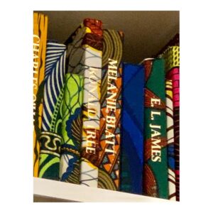 Shaznay Lewis Instagram - Yinka Shonibare’s ‘The British Library’ celebrates the diversity of the British population. Printed on some of the 6,328 books covered in beautiful fabric are the names of first or second generation immigrants to Britain, both celebrated and lesser- known, marking their significant contributions to British culture and history. On at the Tate Modern, I tried so hard to find my name, to the point of dizziness😄🤪..sadly I was unsuccessful! However I did find my dear Melanie Blatt’s name printed in gold, what a beautiful installation. It definitely made me think of my parents and their journey to Britain. Next time I’ll eat before I go and take a magnifying glass. 🤞🏾🖤