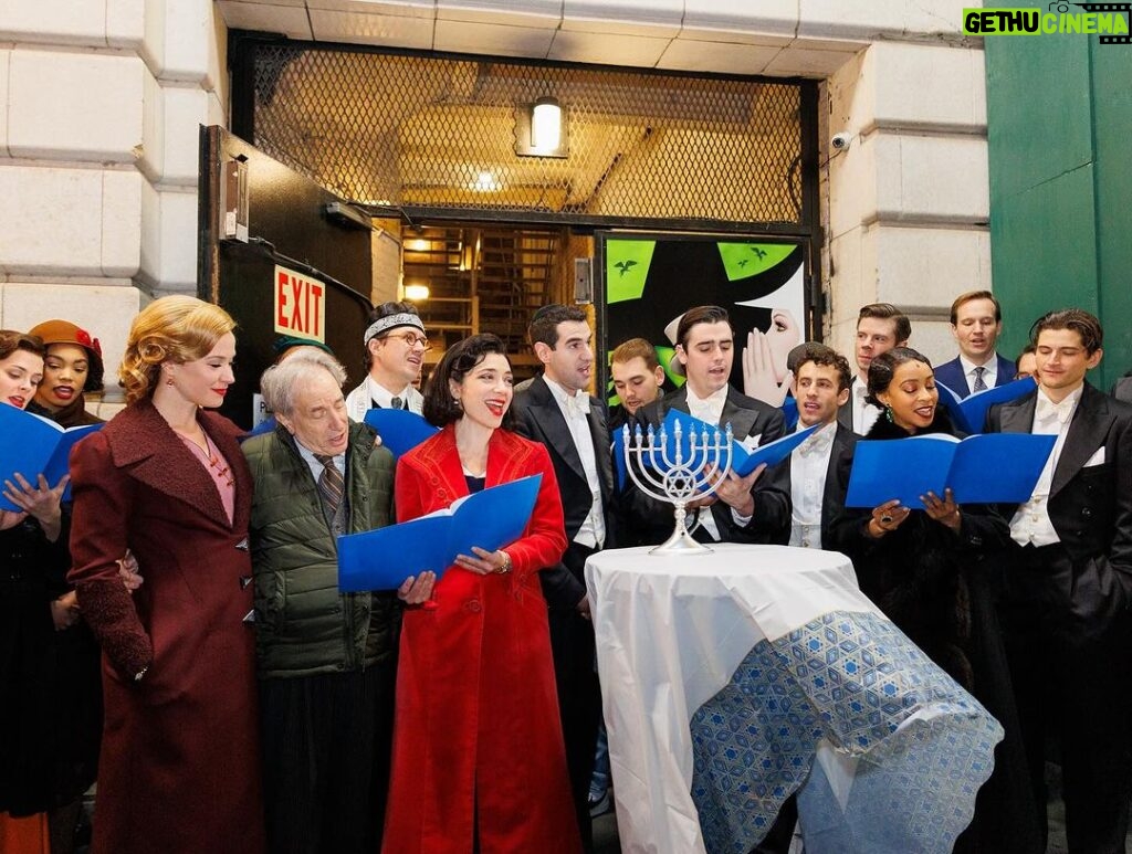 Sierra Boggess Instagram - The cast of @harmonyanewmusical celebrating Hanukkah outside the Barrymore Theatre with a menorah lighting, blessings and songs 🕎💙 Photos: Paul Aphisit