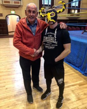 Simon Musk Instagram - It would be nearly impossible to describe the effect Brian Dixon had on the lives of so many people, and I’m not sure I could ever find the words to sum up how thankful I was to have known him. The news today is heartbreaking.

I first met Brian in 2000 when I was trying to break into the wrestling business. I’d written him a letter asking for advice and he’d asked me to come to a show at Leeds Town Hall, where I sold programmes for him. In 2008 I started working for All Star, and for the next 13 years I worked for Brian constantly.

I spent countless hours travelling with Brian in the car and at hundreds of shows up and down the country. Brian wasn’t just a promoter I worked for, I considered him a friend. I grew so fond of all the things that made Brian so unique, especially in later years when I didn’t see him as much. His singing in the car, the way he’d turn the heating up to try and get people to fall asleep on the journeys if he didn’t want to talk to them, the ridiculous nicknames he used for people, all the little sayings & phrases that everyone associated with him. I appreciate how much laughter he gave us more now than ever.

One of my favourite stories was at one of the Butlins camps when we’d all stay over in the chalets. Anyone who ever met Brian came away trying to do an impression of how he spoke, because it was so unique. One night in Minehead, we must have all been particularly loud in the evening telling stories because when we all saw Brian the next morning (who had been in a chalet to himself next to ours), he said about being kept up “I knew it was you lot, because I could hear my own voice all night!”

I couldn’t possibly do justice to how important Brian was to me. I’d never have been able to live my life as a full time professional wrestler without him. He gave me so many opportunities and so many memories, and he was such a huge part of that chapter of my life. Brian changed my life for the better.
 One of the last text exchanges we had, I was fortunate enough to tell him how much I appreciated everything he’d done for me and the reply he sent was so moving and kind.

I loved Brian and I’ll miss him deeply. Thank you for everything ❤️