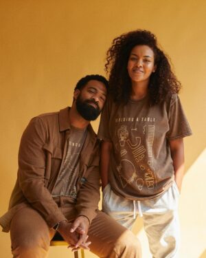 Spencer Paysinger Instagram - I’ve had a front row, backstage, VIP packaged experience seeing @blairpysngr build @post21shop. More than 2 years ago while pregnant with Madden and Cairo hanging off her arm, she tells me she wants to build her own table out of frustration with not being able to support dope black owned businesses under one cohesive marketplace. 

Fast forward to now and @post21shop has 350 products across 75 vendors (and growing.)

The launch of P21’s first T-shirt (designed by @blairpysngr herself) pays homage to those initial creatives who agreed to work with us. The back represents the spine of our company — the undying spirit of Black Wall Street. 

This shirt is a milestone for @post21shop, a celebration of its vendors, and a history lesson for those who believe Black Wall Street ended in 1921. 

Proud of you love! — P21’s 1st Assistant.

LINK IN BIO to purchase.