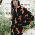 Stella McCartney Instagram - HORSE POWER: A pixelated take on Stella’s iconic rearing stallion, featured in @FTHTSI. Shop #StellaWinter23 dresses at link in bio. Credits Model: @martinabergaminii at @ouimanagement Photography: @markrabadan Styling: @evensmornay_ Casting: @tiagomartinsweb at @ben_grimes_casting Hair: @rimiura at @callisteagency Makeup: @mayumioda25 at @bryantartists #StellaMcCartney