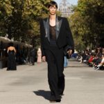 Stella McCartney Instagram - STELLA’S SUSTAINABLE MARKET: A play with proportions. Cropped tailcoats and waffle-knit vests over volume trousers, slim and roomy trenches, tiny #Falabella triangles and #Frayme bucket bags in knotted hemp mesh. Watch the #StellaSummer24 runway show at stellamccartney.com. Credits Wearable art by @AndrewLoganSculptor, exclusively for Stella McCartney #StellaMcCartney #ParisFashionWeek #PFW #StellasSustainableMarket Marché Saxe-Breteuil