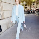 Stella McCartney Instagram - STELLA’S SUSTAINABLE MARKET: In the streets of Paris post-show with our Stella girls. New #Frayme bags are crafted from an organic linen knotted mesh, grown without pesticides and less water than cotton. Its trimmings are in an apple waste-based #vegan alternative to leather, with a recycled lining. Watch the #StellaSummer24 runway show at stellamccartney.com. Credits Wearable art by @AndrewLoganSculptor, exclusively for Stella McCartney #StellaMcCartney #ParisFashionWeek #PFW #StellasSustainableMarket