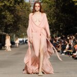 Stella McCartney Instagram - STELLA’S SUSTAINABLE MARKET: Light and loose. The ruffles of stage looks, reinterpreted as tiered organic chiffon dresses, draped shirting, elongated waistcoats. Watch the #StellaSummer24 runway show at stellamccartney.com. Credits Wearable art by @AndrewLoganSculptor, exclusively for Stella McCartney #StellaMcCartney #ParisFashionWeek #PFW #StellasSustainableMarket Marché Saxe-Breteuil
