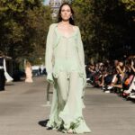 Stella McCartney Instagram - STELLA’S SUSTAINABLE MARKET: Light and loose. The ruffles of stage looks, reinterpreted as tiered organic chiffon dresses, draped shirting, elongated waistcoats. Watch the #StellaSummer24 runway show at stellamccartney.com. Credits Wearable art by @AndrewLoganSculptor, exclusively for Stella McCartney #StellaMcCartney #ParisFashionWeek #PFW #StellasSustainableMarket Marché Saxe-Breteuil