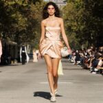 Stella McCartney Instagram - STELLA’S SUSTAINABLE MARKET: Light and loose. The ruffles of stage looks, reinterpreted as tiered organic chiffon dresses, draped shirting, elongated waistcoats. Watch the #StellaSummer24 runway show at stellamccartney.com. Credits Wearable art by @AndrewLoganSculptor, exclusively for Stella McCartney #StellaMcCartney #ParisFashionWeek #PFW #StellasSustainableMarket Marché Saxe-Breteuil
