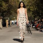 Stella McCartney Instagram - STELLA’S SUSTAINABLE MARKET: A play with proportions. Cropped tailcoats and waffle-knit vests over volume trousers, slim and roomy trenches, tiny #Falabella triangles and #Frayme bucket bags in knotted hemp mesh. Watch the #StellaSummer24 runway show at stellamccartney.com. Credits Wearable art by @AndrewLoganSculptor, exclusively for Stella McCartney #StellaMcCartney #ParisFashionWeek #PFW #StellasSustainableMarket Marché Saxe-Breteuil