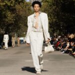 Stella McCartney Instagram - STELLA’S SUSTAINABLE MARKET: A play with proportions. Cropped tailcoats and waffle-knit vests over volume trousers, slim and roomy trenches, tiny #Falabella triangles and #Frayme bucket bags in knotted hemp mesh. Watch the #StellaSummer24 runway show at stellamccartney.com. Credits Wearable art by @AndrewLoganSculptor, exclusively for Stella McCartney #StellaMcCartney #ParisFashionWeek #PFW #StellasSustainableMarket Marché Saxe-Breteuil