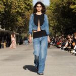 Stella McCartney Instagram - STELLA’S SUSTAINABLE MARKET: Fashion details. Asymmetric draping, corset lacing, bugle bead embellishments, tuxedo bib and cummerbund inserts on organic cotton denim. The Summer 2024 collection is crafted with 95% conscious materials, making it our most responsible edit to date. Watch the #StellaSummer24 runway show at stellamccartney.com. Credits Wearable art by @AndrewLoganSculptor, exclusively for Stella McCartney #StellaMcCartney #ParisFashionWeek #PFW #StellasSustainableMarket Marché Saxe-Breteuil
