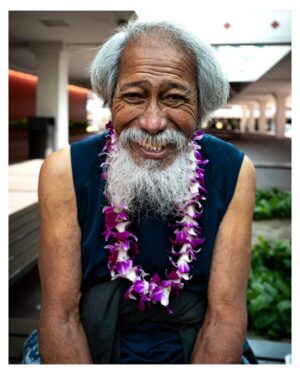 Stephen Hill Instagram - First and Last Unko

As I was leaving the Blaisdell yesterday, an Aunty asked me, "Who are you? You have on a Lei, so you must be somebody." She took off so fast I couldn't take it off and give it to her. So I waited a few minutes and when Uncle walked out with his guitar in tow I gave it to him. I asked if he enjoyed the food, and he said yes. He said he had a good time and that he was happy. He smiled for the camera before playing a tune. I saw his picture in an article from @staradvertiser, and it turns out he was actually the 1st in line for dinner. #chickenskin 

This was my second favorite moment of the day. The first was when a kid gave me a big hug as we shook everyone's hands as they entered the building. Thanks, blessings, and gratitude. 

#stephenhillphotos #leicaphoto  @theleistand #thisisaloha #gratitude