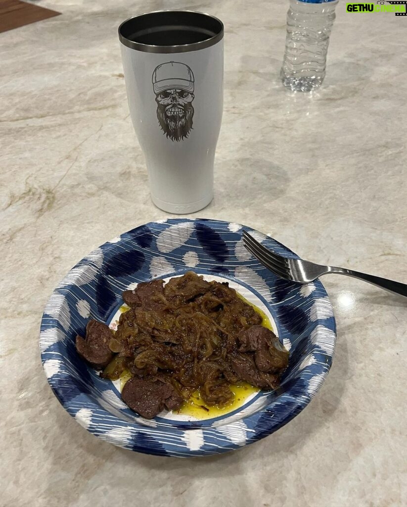 Steve Austin Instagram - Sliced mule deer tenderloin in thin cuts. Sautéed onions in olive oil. Then sautéed tenderloin with garlic and and a pat of butter and mixed them together and seasoned with salt and pepper. Fucking delicious. Moolah on the ready for clean up… #venison #muledeer #deer #chef #usa #america #wildgame @nevadahuntingservices @carsonvalleymeats #silverlab