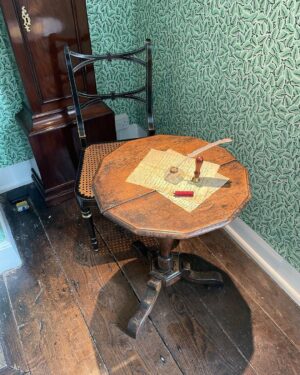 Tamzin Merchant Instagram - THE ACTUAL TABLE where Jane Austen wrote her books ✨This is as close as I have ever got to visiting a shrine
(You weren’t supposed to touch it but I might have touched it the tiniest little bit and now I have a magic pointer finger)
