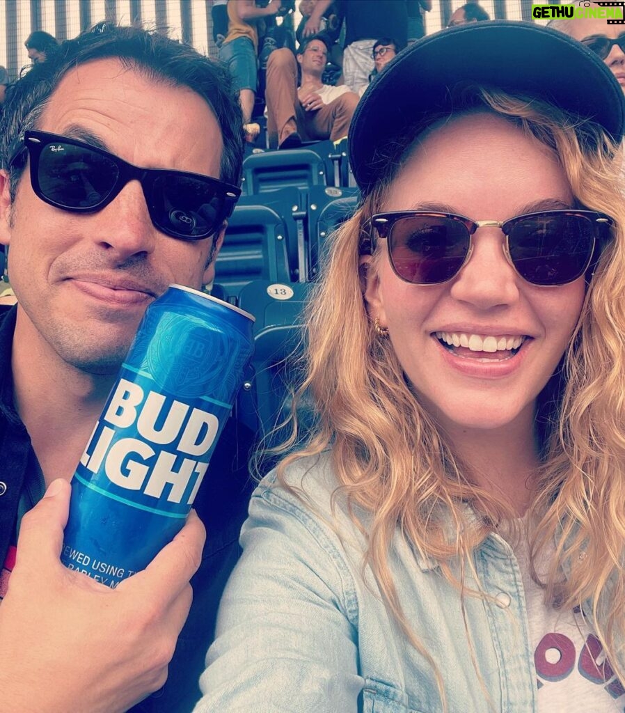 Tamzin Merchant Instagram - A whirlwind few days in New York with this one ❤ Barney’s @mcenroefilm premiered at @tribeca and I am so proud of him for making such a compelling, entertaining and heart-led film ❤ Cannot wait for y’all to see it! I am also proud/impressed that he drank this entire enormous can of Bud Light, which was massively earned 🤓 Yankee Stadium