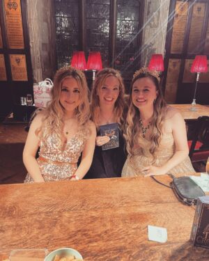 Tamzin Merchant Instagram - I was SO THRILLED to celebrate the brilliant authors of #TwinCrowns @cat_doyle0 and @kwebberwanders at the gorgeous Twin Crowns Ball! 
I was so excited to be there that I barely took any pictures, but here are the three I took!
Can you also tell how thrilled I was to finally meet @gavgav7 too? It was a gorgeous evening celebrating an absolutely brilliant book - get yourself a copy of Twin Crowns, it is the best treat - as soon as I’d finished it I wished I could read it for the first time all over again! ✨👑👑✨xx