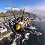 Tanya van Graan Instagram - “You only live once". No, you don't. You live everyday, you just die once. 🤷🏼‍♀️Make it count!! . . . . #FaceYourFears🤪 #snoopyqoute #Capetown #paragliding Thanks @flymarc_ @flyskywings 🙌🏼🌊🙏🏼💦🤙🏼 Cape Town, Western Province, South Africa