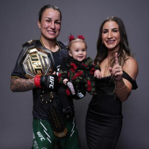 Tecia Pennington Instagram - UFC World Bantamweight Champion 🏆 I am so proud of my wife! We love you endlessly ♥️ Watching your journey over the past 7.5 years (and many years before as a fan/fight friend) and standing by your side I’ve witnessed it all. The highs, the lows, and everything in between. As a wife fight week and day are forever nerve wracking and filled with excitement. On one hand I know you are prepared and believe in your abilities to the fullest and on the other I just want you to have fun and come out injury free. As a fellow athlete I also understand and know the exact feelings/emotions that run thru your head. We are part of the 1%ers…Man we live a wild life but I wouldn’t want anything different. Thank You for inspiring me to keep pushing and working to achieve the same goal. So so proud of you baby… for all your hard work, dedication, resilience, and heart. 🎉 That belt looks amazing on you! #TeamRocky #UFCToronto #ProudFamily #RockNado #UFC297 #AndNew #Championoftheworld