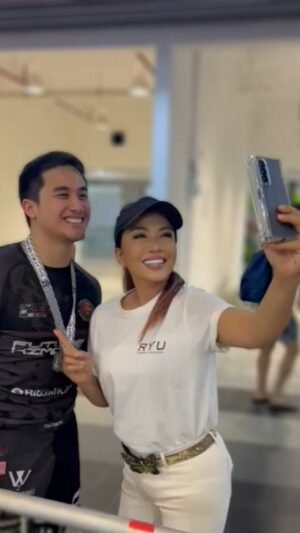 Tiara Jacquelina Instagram - Proud Jiujitsu mom mode this weekend. Put on my RYU t-shirt to cheer for my son Dani and the @ryucombatacademy team. 

It was well worth the afternoon - watching Dani so composed and calm throughout 3 incredible comeback fights to win a silver medal. And the camaraderie amongst the team, so heartwarming. And of course, the icing on the cake - the RYU team winning a well-deserved best overall team of the tournament trophy!

#jiujitsu #teamspirit #fightingspirit #proudmom #jiujitsumom