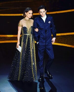 Timothée Chalamet Instagram - honored to have presented w/ @natalieportman at the Oscars last night. congrats to flyest human alive Jacqueline Durran for winning best costume design.