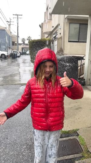 Timothy V. Murphy Instagram - Looks like some kids like the rain…good Irish blood in him…Seàn…☘️☘️☘️💦💦💦