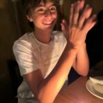 Tom Brady Instagram - My son Benny, can you believe it? Fourteen years old already! It seems like yesterday you were running around in your superhero cape, and now you’re definitely a superhero to me ❤️ You’ve grown so much, and not just in height (seriously, watch out @gronk) You’ve grown in kindness, smarts, and all-around awesomeness. Your ability to make people laugh, your knack for solving problems, and your endless debating skills 🤣 make you a force to be reckoned with. We love you so much. You are a blessing to us all and we adore you! P.S. No, you can’t stay up until 3 AM playing video games now that you’re 14. Nice try tho 🤣