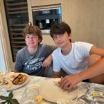 Tom Brady Instagram - My son Benny, can you believe it? Fourteen years old already! It seems like yesterday you were running around in your superhero cape, and now you’re definitely a superhero to me ❤️ You’ve grown so much, and not just in height (seriously, watch out @gronk) You’ve grown in kindness, smarts, and all-around awesomeness. Your ability to make people laugh, your knack for solving problems, and your endless debating skills 🤣 make you a force to be reckoned with. We love you so much. You are a blessing to us all and we adore you! P.S. No, you can’t stay up until 3 AM playing video games now that you’re 14. Nice try tho 🤣