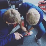 Wayne Rainey Instagram - One of my favorite moments in Japan, my son @rexrainey03 helping me prepare to ride a motorcycle.