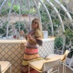 Yana Rudkovskaya Instagram - A beautiful garden and champagne in a favorite exclusive place is Louis Vuitton in Saint Tropez 💚