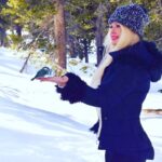 Yvette Rachelle Instagram - 💛💚💙The beauty of #springsnow being at peace in the forest with wildlife #wildbirds The wild birds actually peacefully ate seed from my hand in the mountain wilderness. How amazing💙💜Its Springtime snow but keeping warm in my favorite super cute and soft #Mukluks #beanieseason #pomhat made with #popcornyarn #lovemukluks💜❤️Now, if all beings could just peacefully co-exist what a more beautiful world it would be….Sending every being on the planet #infinitelove 💙💚and #worldpeace 🌎 Actress #TopModel #animalactivists #yvetterachelle