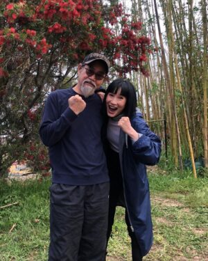 Meng'er Zhang Instagram - Things that you probably don’t know about these people and why I love them.
PART 1.

P1-Michelle’s wrap day; I thought she was serious before I met her because of the roles she played. But actually she’s a complete goofball that lights up the room with her energy. @michelleyeoh_official 

P2-Florian and I trying to figure out whose muscles are bigger; well, obviously him. Once he told a joke, I laughed so hard that fell with my chair, and he grab me and my chair with one hand. He’s very afraid of cockroaches.
@bignasty 

P3-🙄when you look at someone who’s so much taller than you

P4-Master Yuen’s wrap day; Master Yuen’s always chill. I remember once we were in the makeup trailer, Florian was watching a football game and he screamed suddenly because of a goal. We were all frightened, only Master Yuen so calm, turned around with a smile on his face. He’s a real master. #yuenwah 

P5-Andy on a boat; Andy may look like a tough fighter, but his real weakness is seasickness. @andyle_official