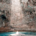 Aakriti Rana Instagram - Would you fly 15,000 kms to experience this? 📍One of the most beautiful cenotes in Mexico. This is Cenote Suytun. Here is a fun fact! Do you know that Cenotes played significant role to the Mayan people because they were the only source of fresh water?! It is believed the human sacrifice was conducted when the Maya were experiencing a long drought. Cenotes were spiritual places for Mayans. #aakritirana #cenote #cenotesuytun #mexico #yucatan #tulum #mexico🇲🇽 #reelsinstagram #travelblogger #indiantravelblogger #mayans #funfact Cenote, Suytun, Valladolid, Yucatan.