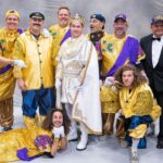 Adam Devine Instagram - So this past Sunday I was the King of Bacchus! One of the biggest Mardi Gras parades in New Orleans! It was an incredible honor and maybe one of the coolest experiences of my life. Thank you to John and Anna Beth Goodman, The Brennan family, George Grimes and everyone who made this unbelievable experience happen for myself, my family, and friends. Hail Bacchus!!! 🙌 1) as this King I had rain down plastic beads for the people! Sorry if I hit you in the face but hey it’s Mardi Gras baby! 2) My family came out to support and we partied all night in a convention hall with 9500 of our new best friends. God I love New Orleans. 3) Blake was there and we went hard. As we do. 4) All the homies got to ride on the float directly behind me and shower the people with jewels (plastic beads). 5) Had to take a shot with the best bud @atibaphoto before strapping myself in for the 4 hours of parading. 6) A past king was there! @anthonymackie. He gave me advice on being a good king. (Throw tons of beads). 7) practicing the previous Kings advice. 8) @chloebridges the Yas Queen and her court partied (took tons of photos) as we paraded. 9) Took time to thank the military before getting on the float. It ‘‘twas the Nobel thing to do! 10) The King and his Court. Some old and some less old. Damn did we have a good time! New Orleans, Louisiana