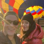 Adam Devine Instagram - I cannot believe it’s been 1 year already. I love you to the moon! That’s why on our anniversary we took this hot air balloon as close to the moon as we possibly could. Love you Chlo Chlo! Here’s to 60 more trips around the sun with you.