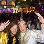 Adam Devine Instagram - So this past Sunday I was the King of Bacchus! One of the biggest Mardi Gras parades in New Orleans! It was an incredible honor and maybe one of the coolest experiences of my life. Thank you to John and Anna Beth Goodman, The Brennan family, George Grimes and everyone who made this unbelievable experience happen for myself, my family, and friends. Hail Bacchus!!! 🙌 1) as this King I had rain down plastic beads for the people! Sorry if I hit you in the face but hey it’s Mardi Gras baby! 2) My family came out to support and we partied all night in a convention hall with 9500 of our new best friends. God I love New Orleans. 3) Blake was there and we went hard. As we do. 4) All the homies got to ride on the float directly behind me and shower the people with jewels (plastic beads). 5) Had to take a shot with the best bud @atibaphoto before strapping myself in for the 4 hours of parading. 6) A past king was there! @anthonymackie. He gave me advice on being a good king. (Throw tons of beads). 7) practicing the previous Kings advice. 8) @chloebridges the Yas Queen and her court partied (took tons of photos) as we paraded. 9) Took time to thank the military before getting on the float. It ‘‘twas the Nobel thing to do! 10) The King and his Court. Some old and some less old. Damn did we have a good time! New Orleans, Louisiana