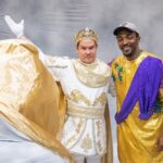 Adam Devine Instagram - So this past Sunday I was the King of Bacchus! One of the biggest Mardi Gras parades in New Orleans! It was an incredible honor and maybe one of the coolest experiences of my life. Thank you to John and Anna Beth Goodman, The Brennan family, George Grimes and everyone who made this unbelievable experience happen for myself, my family, and friends. Hail Bacchus!!! 🙌 1) as this King I had rain down plastic beads for the people! Sorry if I hit you in the face but hey it’s Mardi Gras baby! 2) My family came out to support and we partied all night in a convention hall with 9500 of our new best friends. God I love New Orleans. 3) Blake was there and we went hard. As we do. 4) All the homies got to ride on the float directly behind me and shower the people with jewels (plastic beads). 5) Had to take a shot with the best bud @atibaphoto before strapping myself in for the 4 hours of parading. 6) A past king was there! @anthonymackie. He gave me advice on being a good king. (Throw tons of beads). 7) practicing the previous Kings advice. 8) @chloebridges the Yas Queen and her court partied (took tons of photos) as we paraded. 9) Took time to thank the military before getting on the float. It ‘‘twas the Nobel thing to do! 10) The King and his Court. Some old and some less old. Damn did we have a good time! New Orleans, Louisiana