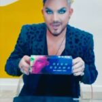Adam Lambert Instagram - Introducing the Adam Lambert x ORLY collab collection: Meet 𝗛𝗶𝗴𝗵 𝗗𝗿𝗮𝗺𝗮. 👨‍🎤🎸✨ ⠀⠀⠀⠀⠀⠀⠀⠀⠀ This 6 shade, no-skips collection corresponds with Adam’s new album, High Drama, out now! ⠀⠀⠀⠀⠀⠀⠀⠀⠀ A portion of proceeds from this collection will go towards supporting the Stand with Trans organization, head to ORLYBeauty.com to shop this limited-edition collab! 🏳️‍⚧️🌈 ORLY Color Labs