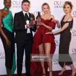 Aimee Lou Wood Instagram - THANK YOU @olivierawards . Had so much fun with the glorious @sheilaatim on Sunday. Lovely to present the gorgeous, dazzling, BRILLIANT @jodiemcomer and Paul their awards. Dress is vintage @viviennewestwood via @anniesibiza . Make up and hair by the TALENTED @society_makeup 💖💖💖💖💖