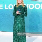 Aimee Lou Wood Instagram - Thank you @newportbeachfilmfest for the award. How lovely to spend the eve with my collection of uncles. @lizpughmakeupartist @georgenorthwood @leithclark @maisonvalentino