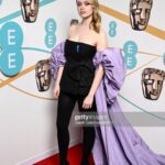 Aimee Lou Wood Instagram - Purple train purple train. @leithclark @sarahillmakeup @georgenorthwood @bafta be