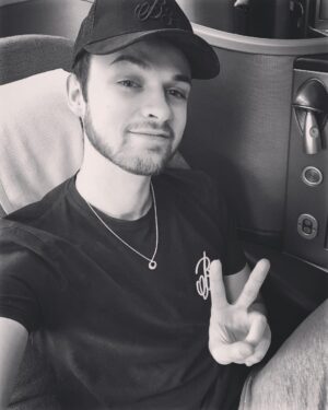 Alastair Aiken Instagram - Posting this 30,000ft in the air ✈️, as I’m mid-flight from the UK ➡️ US for a secret gaming project! 👀🎮 Can anyone guess which game it is...? 🤔