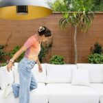 Alex Morgan Instagram - The patio is officially our favorite getaway😆 Thanks to @arhaus for keeping us cozy! #myarhaus