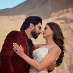 Amaal Mallik Instagram - This is me trying to keep my self alive at this incredibly high mountain peak, Part 2 🤯 - All while trying to balance my body weight on this boulder and pull in some oxygen to sing the lyrics because I can’t lip sync. - I hadn’t eaten a morsel for 6 hours and had slept for 4, because our shoot was called off the day prior due to a protest in Ladakh. - @hashimbachooali my producer was very low on oxygen and had to get medical aid immediately, so had to get into the production nitty grities with my father which isn’t too pretty. - @krishtrivedi7 being who he is kept things calm with @aamnasharifofficial and kicked me on my arse and helped us make history. - @yogeshbhanushali07 & @imdhanraj made it come alive on screen through their brilliance in their respective art forms of cinematography & choreography. Aur khudki tareef ab main kya hi karun !? I’m darn good at juggling so many things at once, and I love a challenge🤘🏻 So, along with all the above mentioned factors plaguing my mind, I went for the take and not once did I ever let my heroine fall, specially not from here 😋 Ab yeh #Mohabbat nahi toh kya hain ? #TrendingOnReels #TrendingSongs #AmaalMallik #AamnaSharif #AM111 @tseries.official