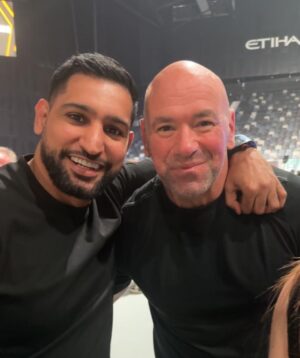 Amir Khan Instagram - With @jake.brocklesby1 in Abu Dhabi. Met the main man @danawhite  at Ufc 294 weigh in. Mega fights tomorrow, - Makhachev vs volkanovski 2. Usman vs Chimaev 
Who you got? @ufc